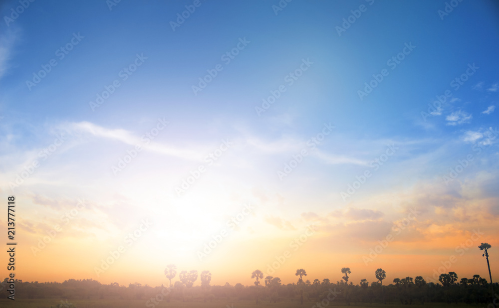 Earth day concept: Sun light and early morning mountain sky of heaven background