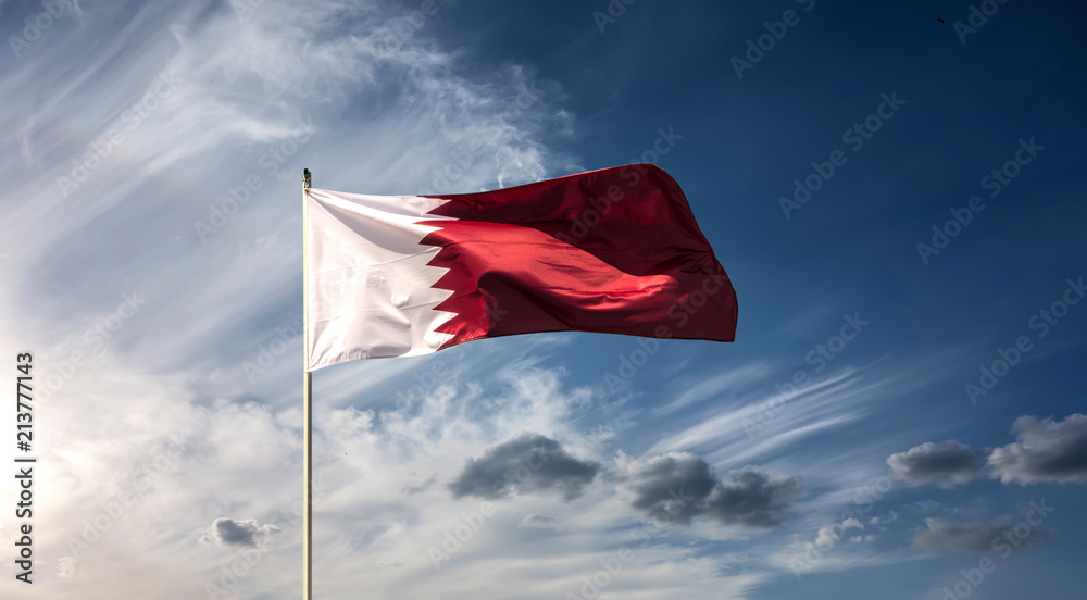 Flag of the country Qatar waving in the wind Flag of the country Qatar waving in the wind
