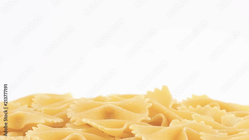 Italian pasta rotating on white background, copy-space (loopable). 4K UHD Italian pasta rotating on white background, copy-space (loopable). 4K UHD
