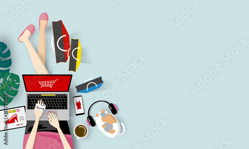 Online shopping concept of woman holding credit card and using laptop computer vector illustration