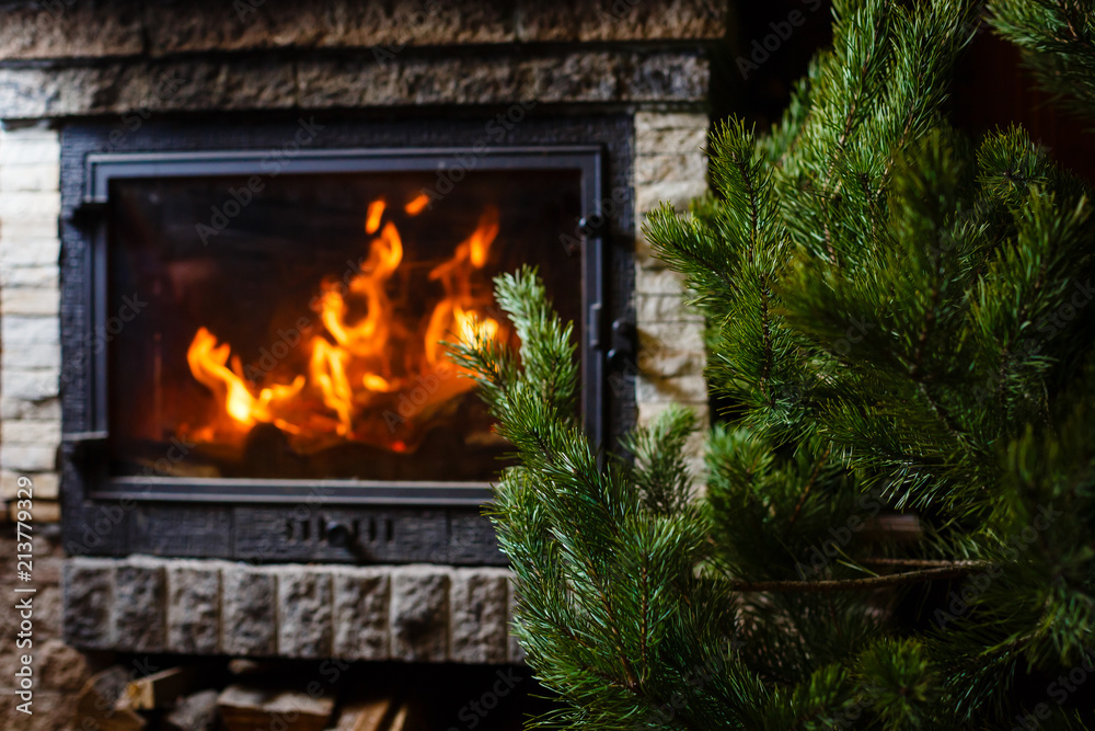 A fire burns in a fireplace, Fire to keep warm. A fire burns in a fireplace, Fire to keep warm.