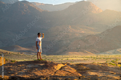 Sportsman in amazing mountain scenery in Africa