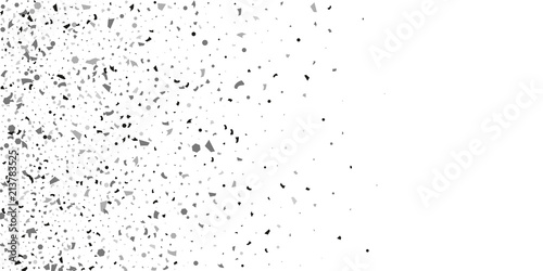 Silver glitter confetti on a white background.