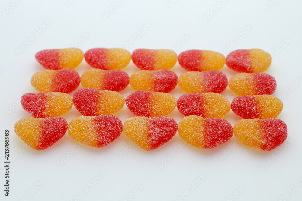 Sweet marmalade in the shape of hearts on a white background Sweet marmalade in the shape of hearts on a white background