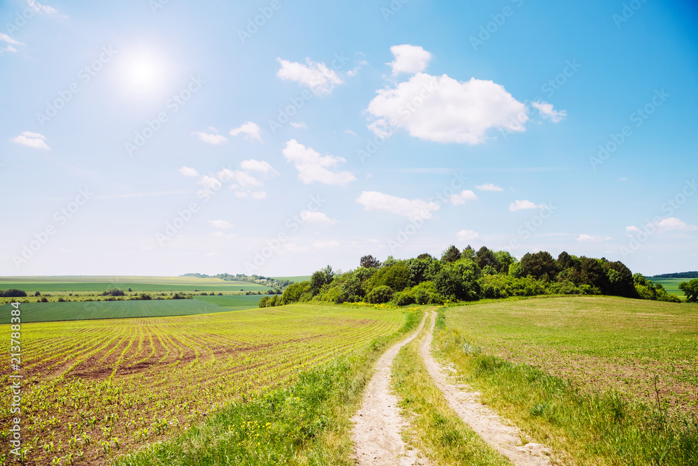 Rural scene white fluffy clouds.