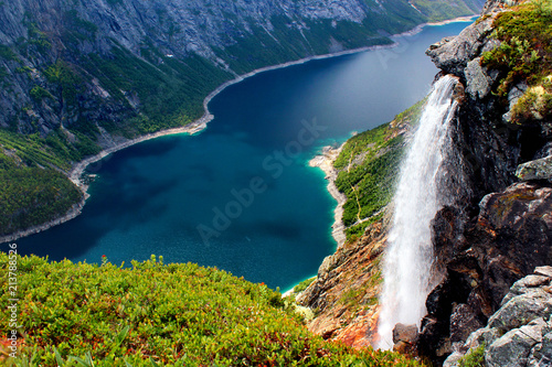 Lake Ringedalsvatnet and a waterfall on the way to Trolltunga, Norway. Beautiful scandinavian landscape.