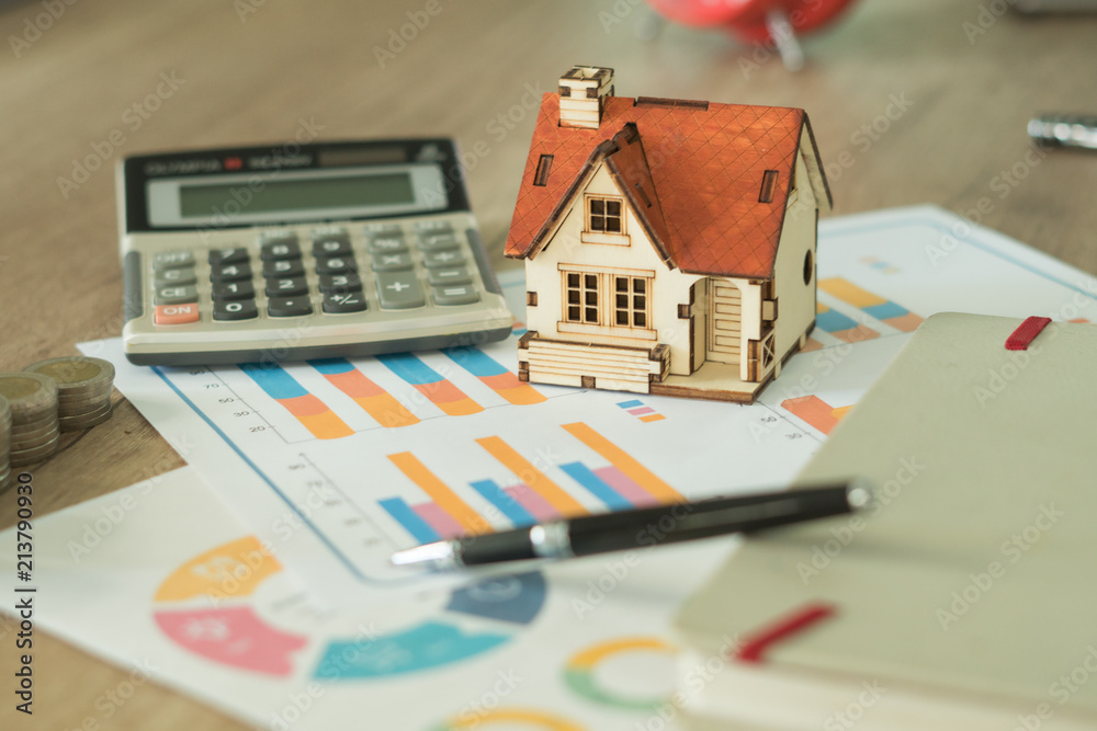 custom made wallpaper toronto digitalFinancial paper and work station and house model with tablet on working table, business concept.