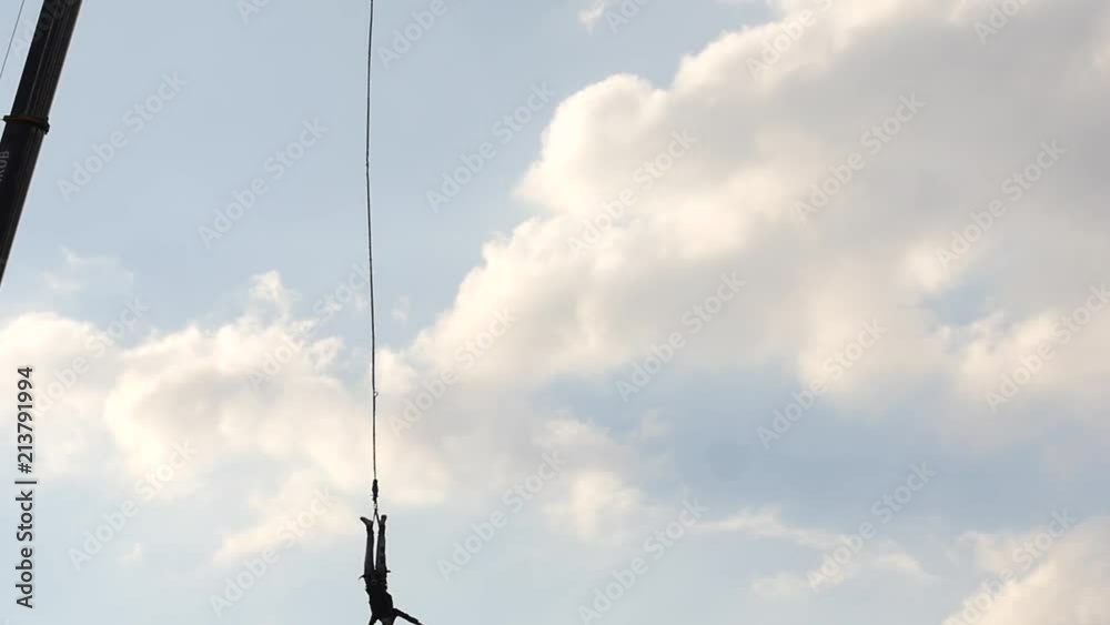 Man silhouette jumping with banjo in slow motion Man silhouette jumping with banjo in slow motion