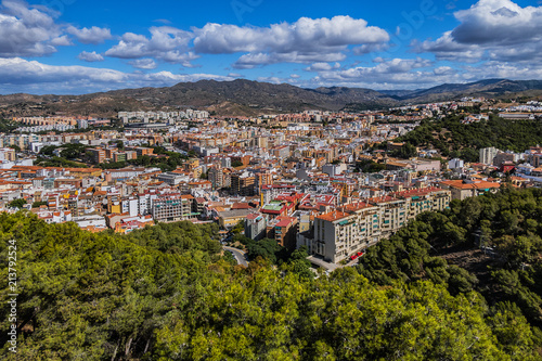 Beautiful aerial view on the Malaga center from Gibralfaro Castle on a sunny day. Malaga, Costa del Sol, Andalusia, Spain.