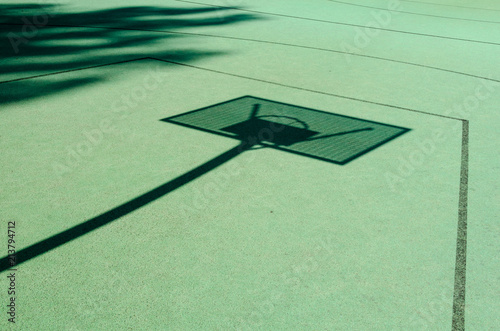 shadow of a basketball basket