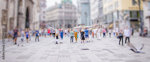 Photography Crowd of anonymous people walking on busy city street, urban city life backgroun