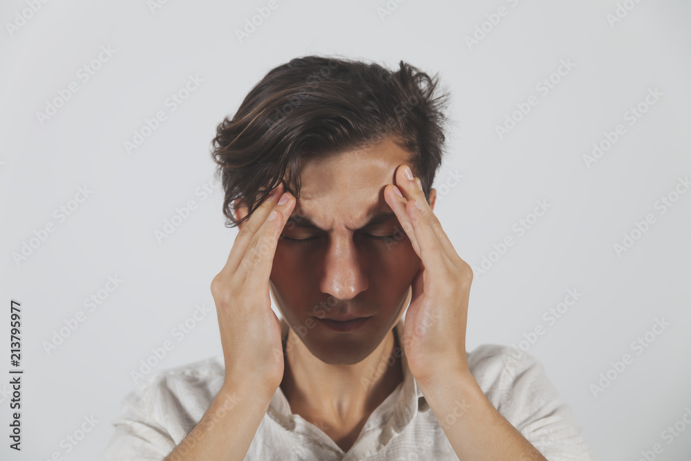 Stressed, Frustrated, Young Man Has Headache Stressed, Frustrated, Young Man Has Headache