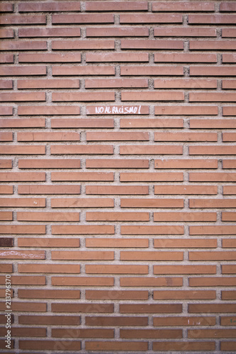 Brick wall with social message