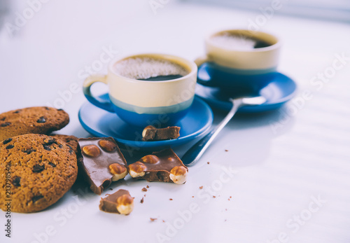 hot coffee, chocolate and cookies in morning
