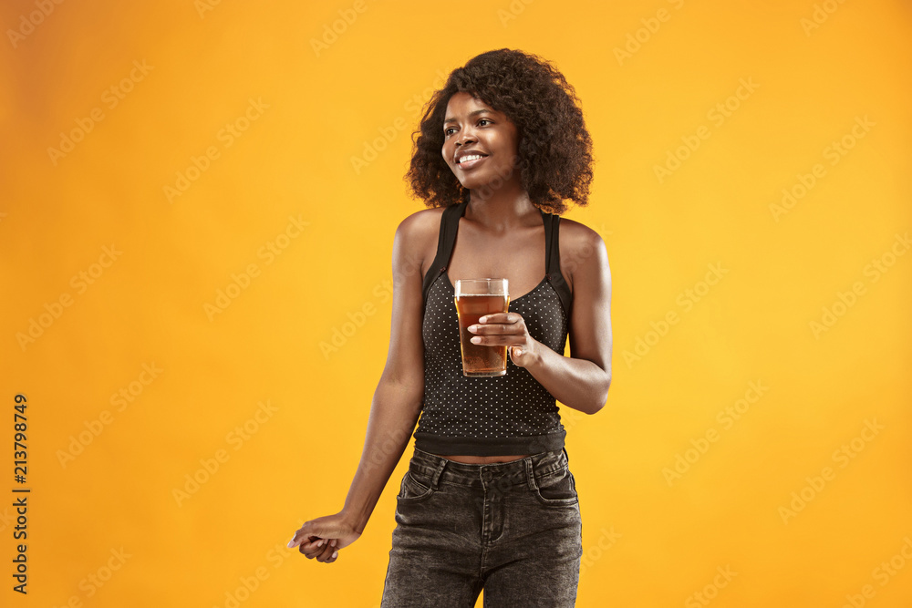 Sexy young afro woman drinking beer, not isolated on white background Sexy young afro woman drinking beer, not isolated on white background