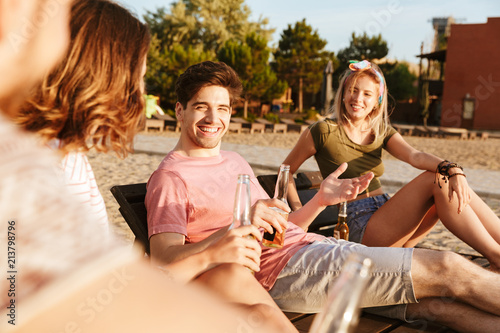 Group of happy friends dressed in summer clothing