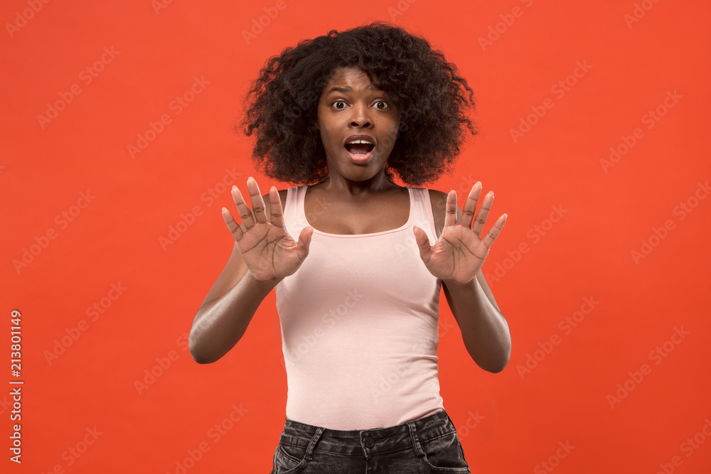 Portrait of the scared woman on red Portrait of the scared woman on red