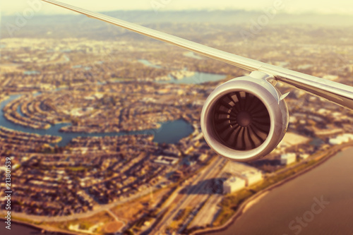 airplane engine above the  of Redwood Shores State Marine Park and Foster city. San Francisco. California. USA photo