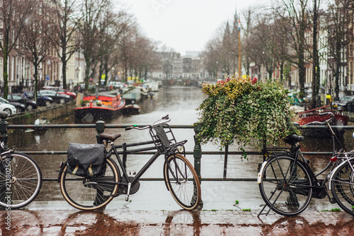 Bike on day light during the rain.