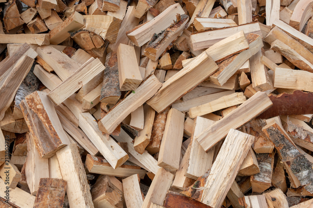 A pile of punctured firewood. A pile of punctured firewood.