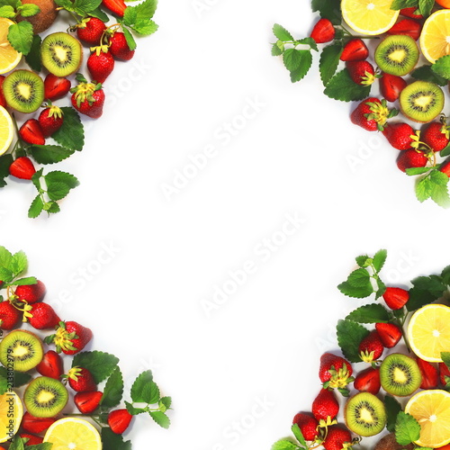 citrus fruits and strawberries on a white background