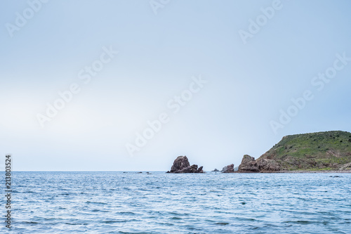 Rocks in the background from the Embarcadero beach