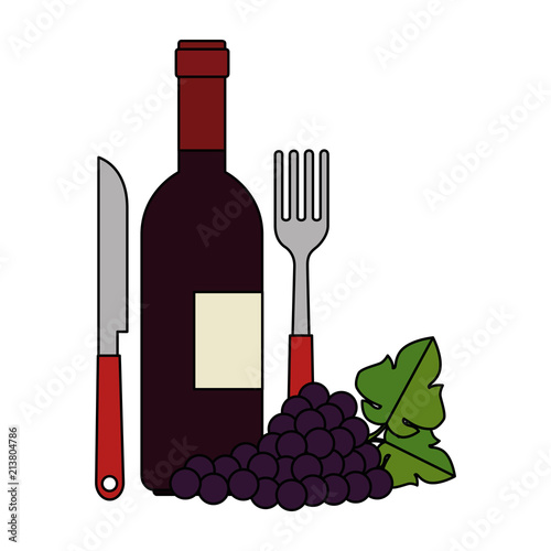 wine bottle with cutleries and grapes