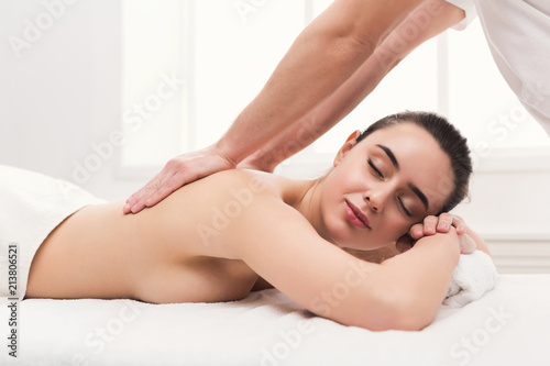 Woman getting classical back and neck massage