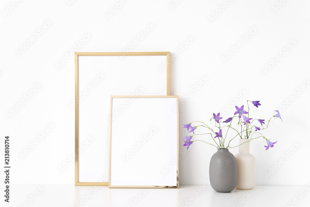 Gold portrait a4 and a5 frame mockup with wild lilac bellflower in