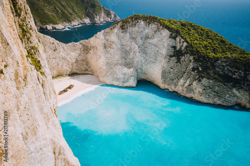 Navagio beach or Shipwreck bay with turquoise water and pebble white beach. Famous landmark location. overhead landscape of Zakynthos island, Greece