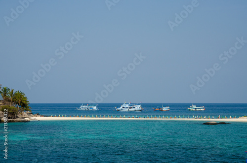 the floating boat on the beach has a beach front © NIPATHORN