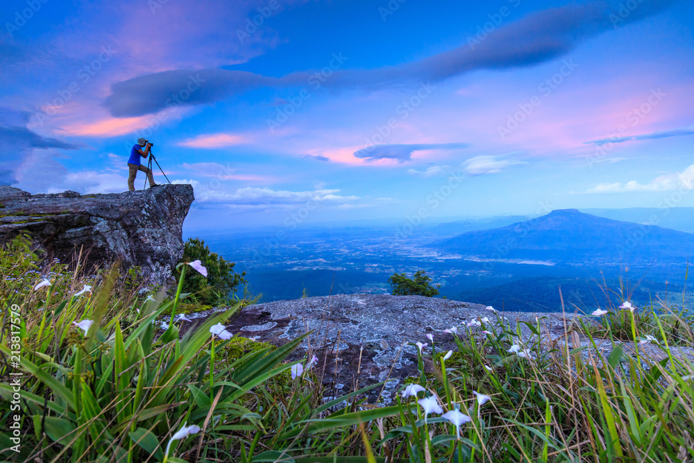 Photographer take a photo on  high mountain in Phu-Luang,  Loei province, Thailand.