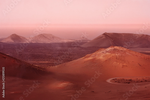 Fototapeta Naklejka Na Ścianę i Meble -  mountains and hills during dust sand storm. Mars red planet imitation. Marsian landscape. Toned