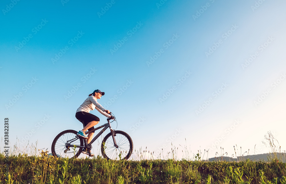 Woman ride a bicykle