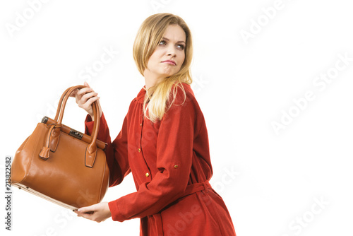 Woman protecting her handbag