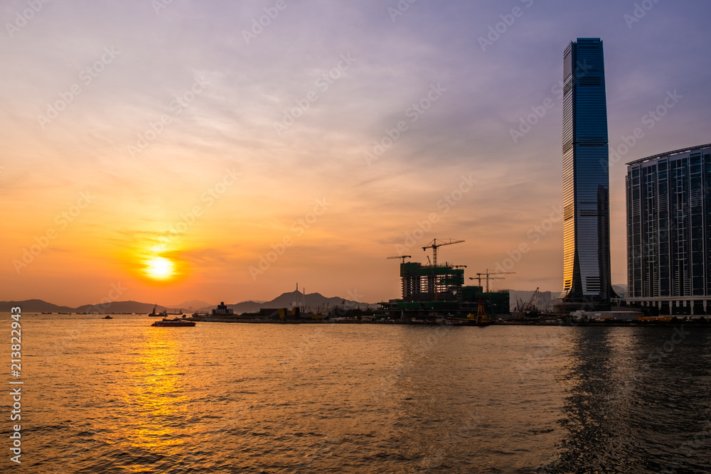 Sunset of Victoria Harbor of Hong Kong