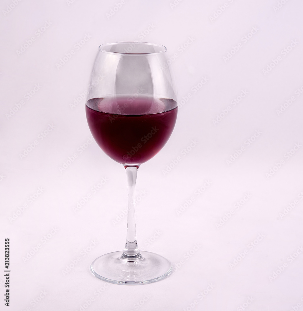 glass of red wine on white background glass of red wine on white background