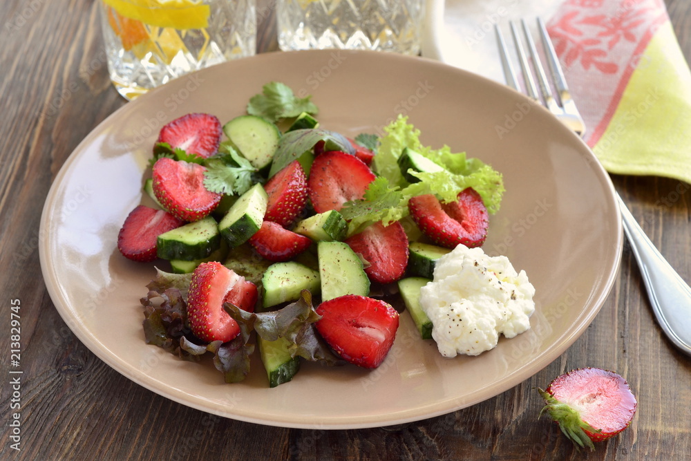 Strawberry salad with cucumber and lettuce with yogurt sauce Strawberry salad with cucumber and lettuce with yogurt sauce