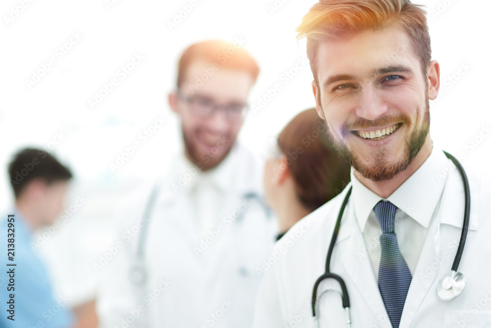 Portrait of friendly male doctor smiling Portrait of friendly male doctor smiling
