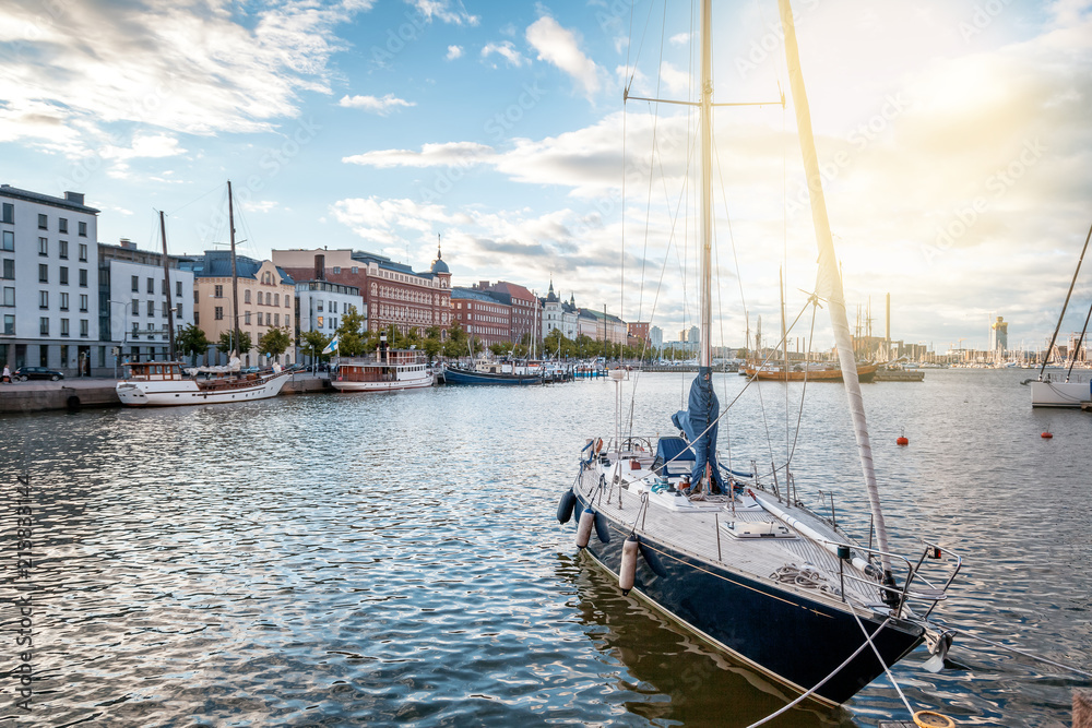 Beautiful cityscape, Helsinki, the capital of Finland, view of the embankment with boats and houses, travel to Northern Europe