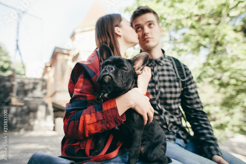 Loving couple with pet french bulldog © Victoriya Bulyha