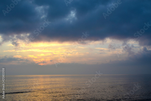 Light mood with orange illuminated clouds during a sunrise over the Baltic Sea in Bansin on usedom  Germany