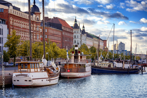Beautiful cityscape, Helsinki, the capital of Finland, view of the embankment with boats and houses, travel to Northern Europe photo