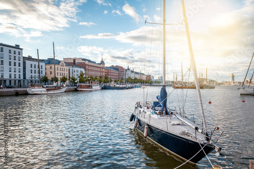 Beautiful cityscape, Helsinki, the capital of Finland, view of the embankment with boats and houses, travel to Northern Europe