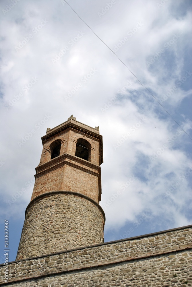 small village civic tower in the italian countryside