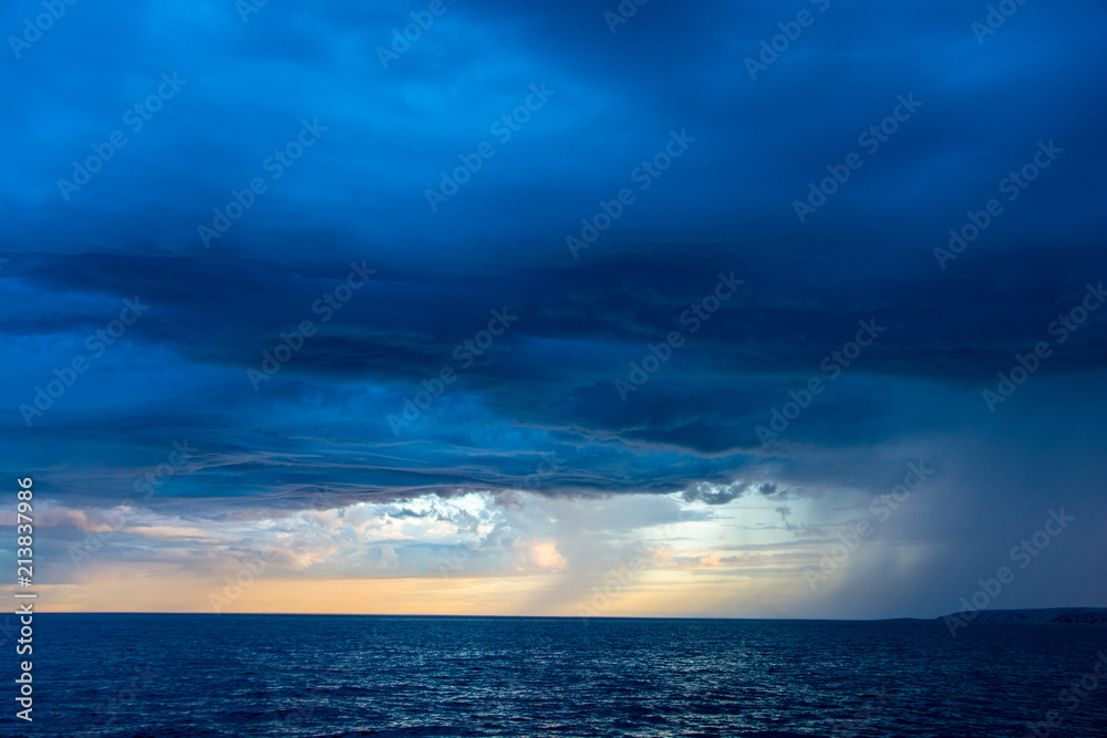 Sea, sky and dark cloud