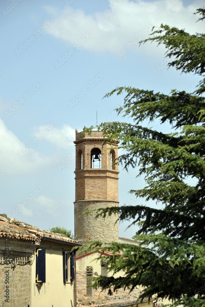 small village civic tower in the italian countryside