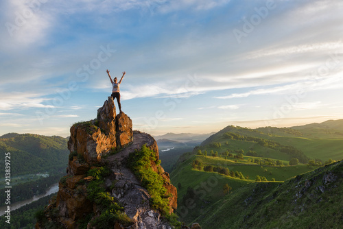 Happy man and woman on top ...
