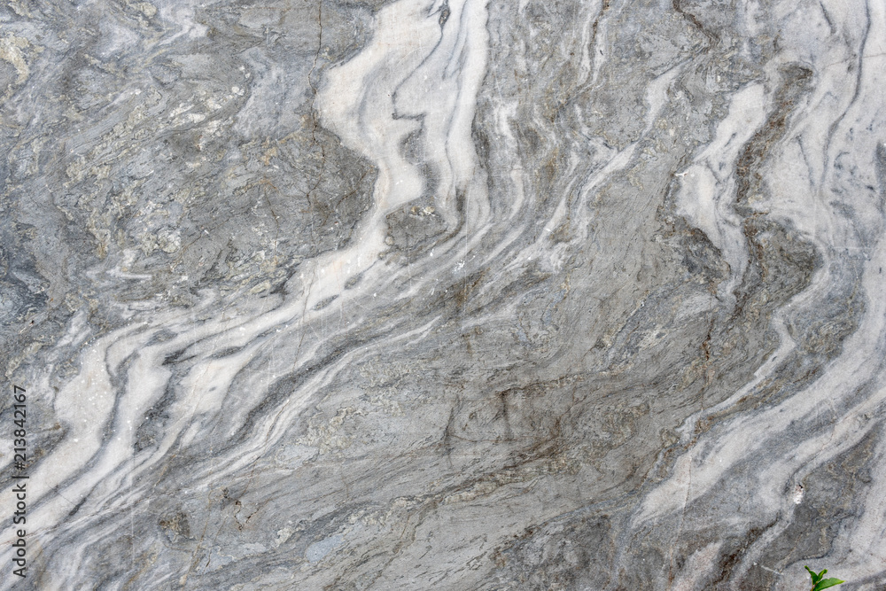 Naklejka premium Gray surface of marble stone with striped streaks.