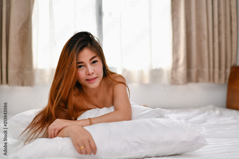 Sexy women concept. Sexy girl are playing in the bedroom. Sexy women concept. Sexy girl are playing in the bedroom.